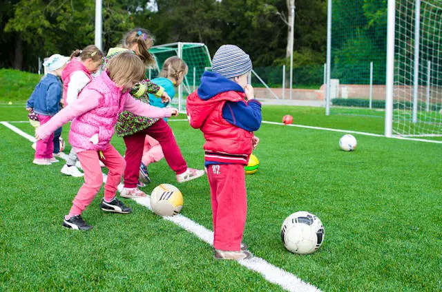 kids playing football