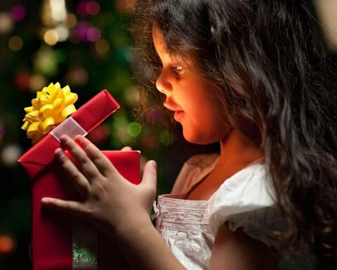 child with gift pack